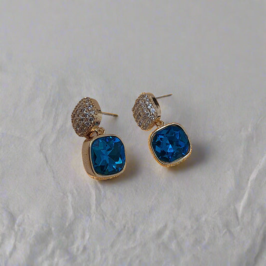 Blue stone golden earrings festive party jewellery elegant display