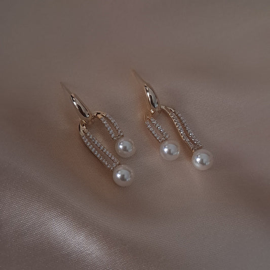 Stone studded earrings with pearl drops beautiful jewellery