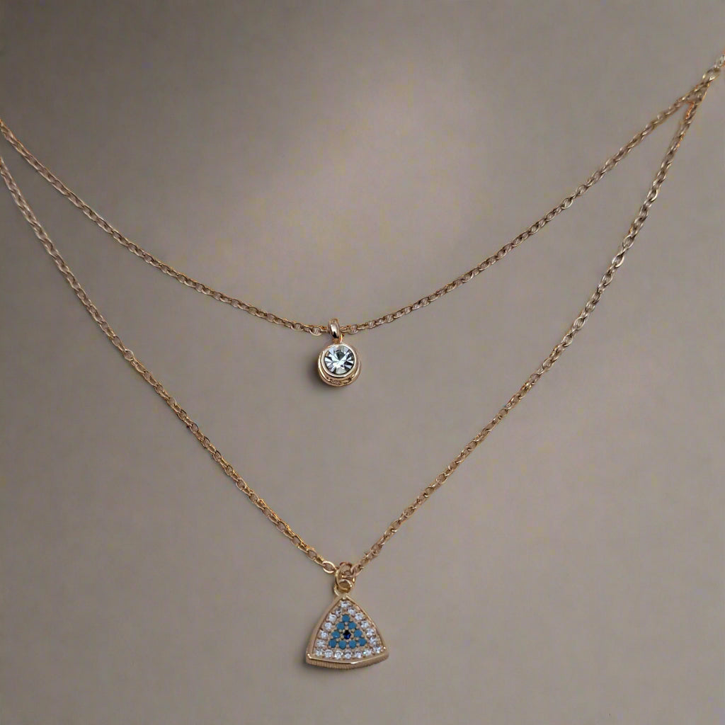 Mystique evil eye necklace dual layer design with delicate crystal