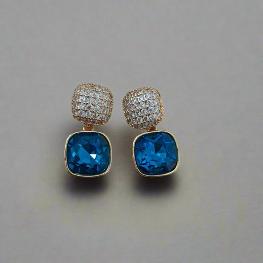 Two pairs of gold and blue stone earrings