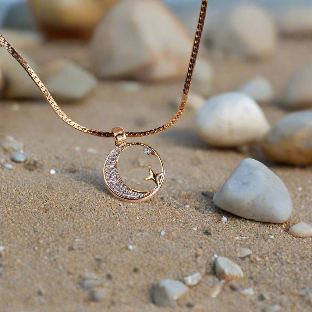 Golden crescent moon necklace jewelry display