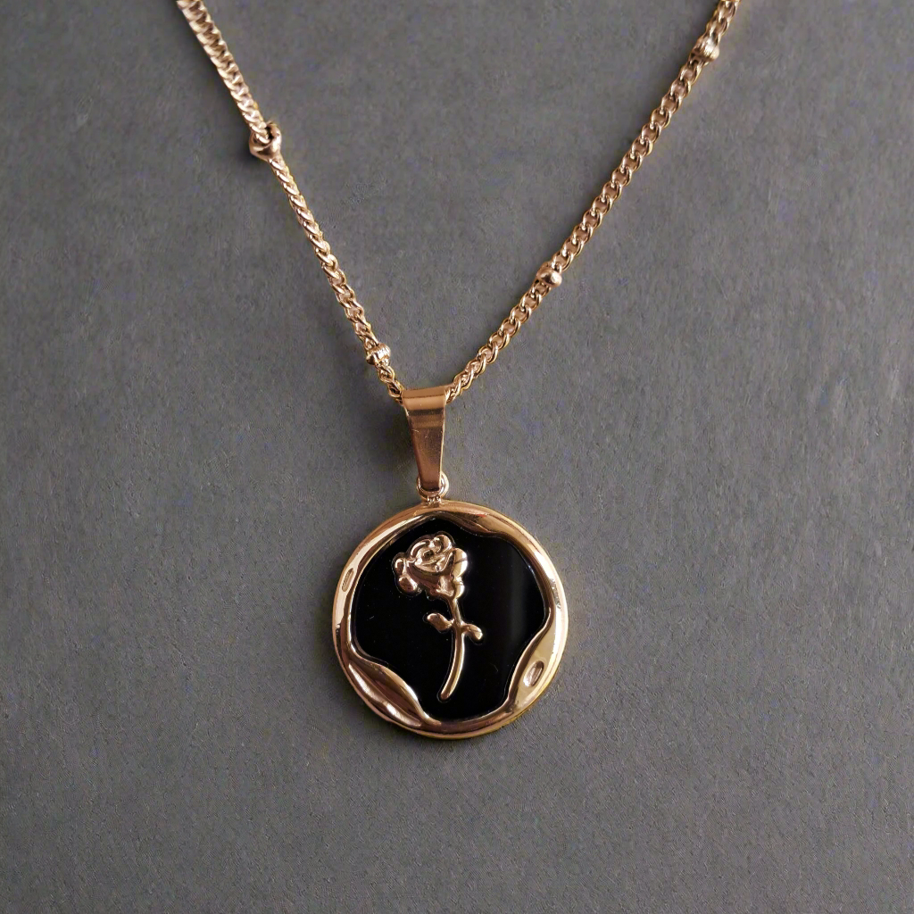 Golden necklace with rose design pendant jewelry