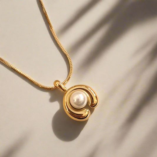 Lunara anti-tarnish necklace with pearl in gold-tone crescent setting