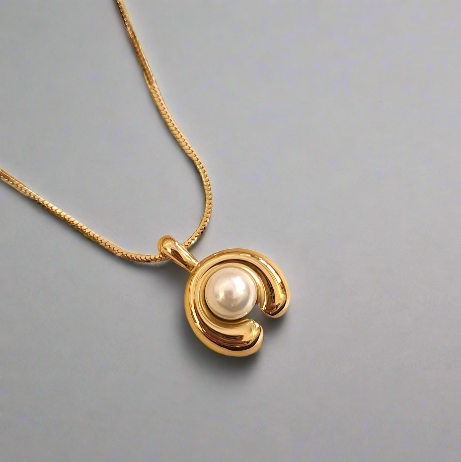 Anti-tarnish pearl necklace close-up crescent design details