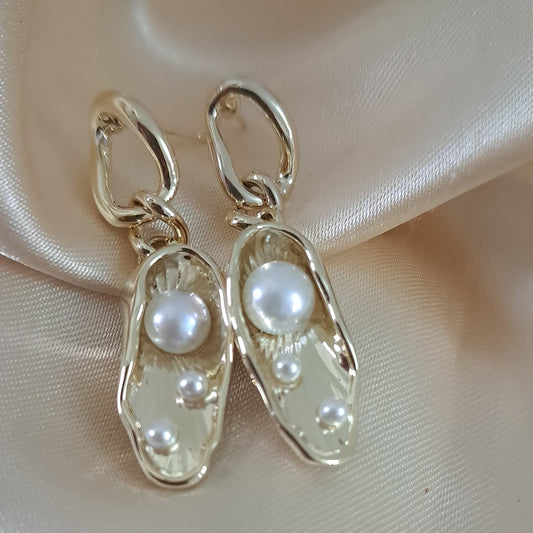 Pearl drop golden earrings with lustrous pearls elegant jewellery