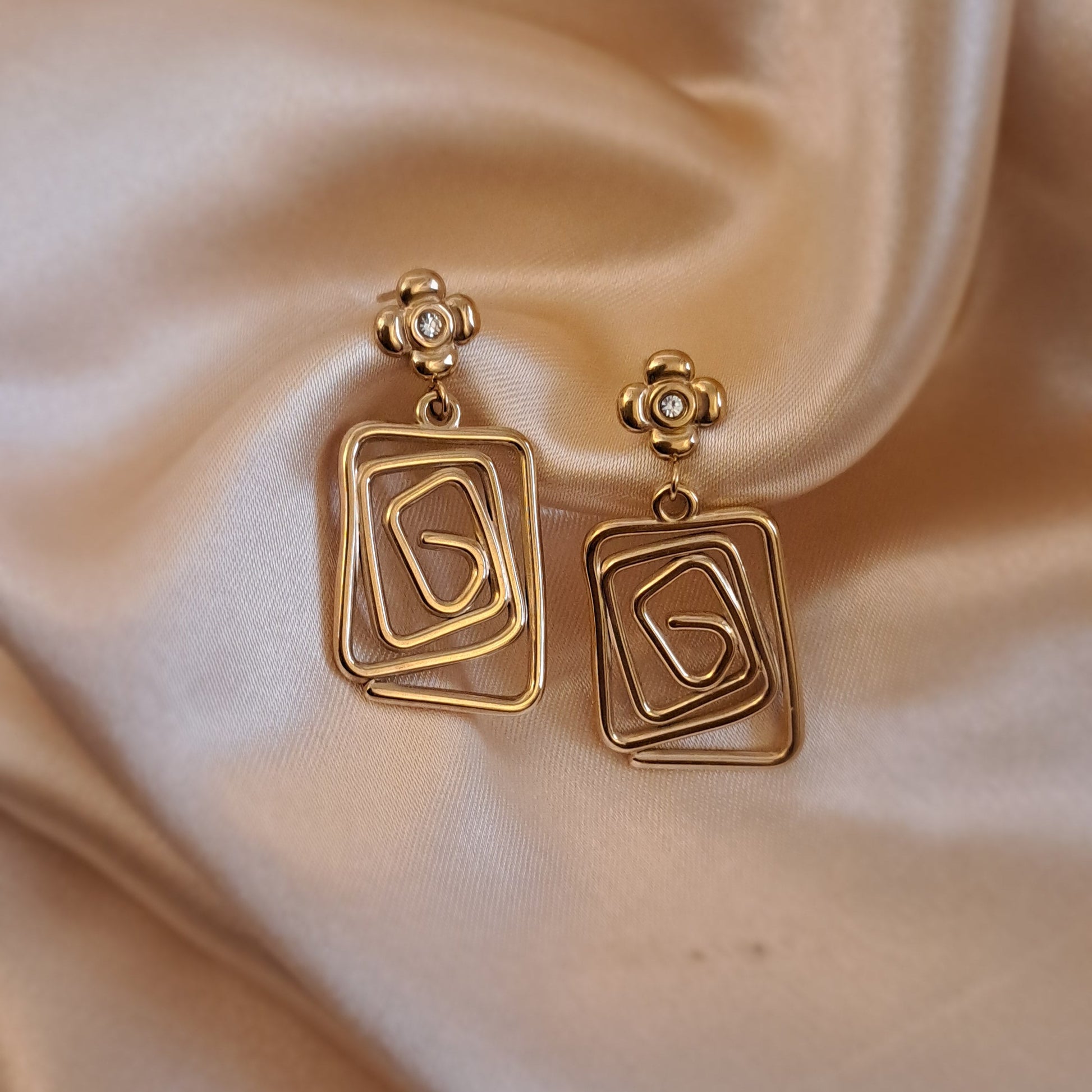 Golden spiral square earrings perfect parties celebrations
