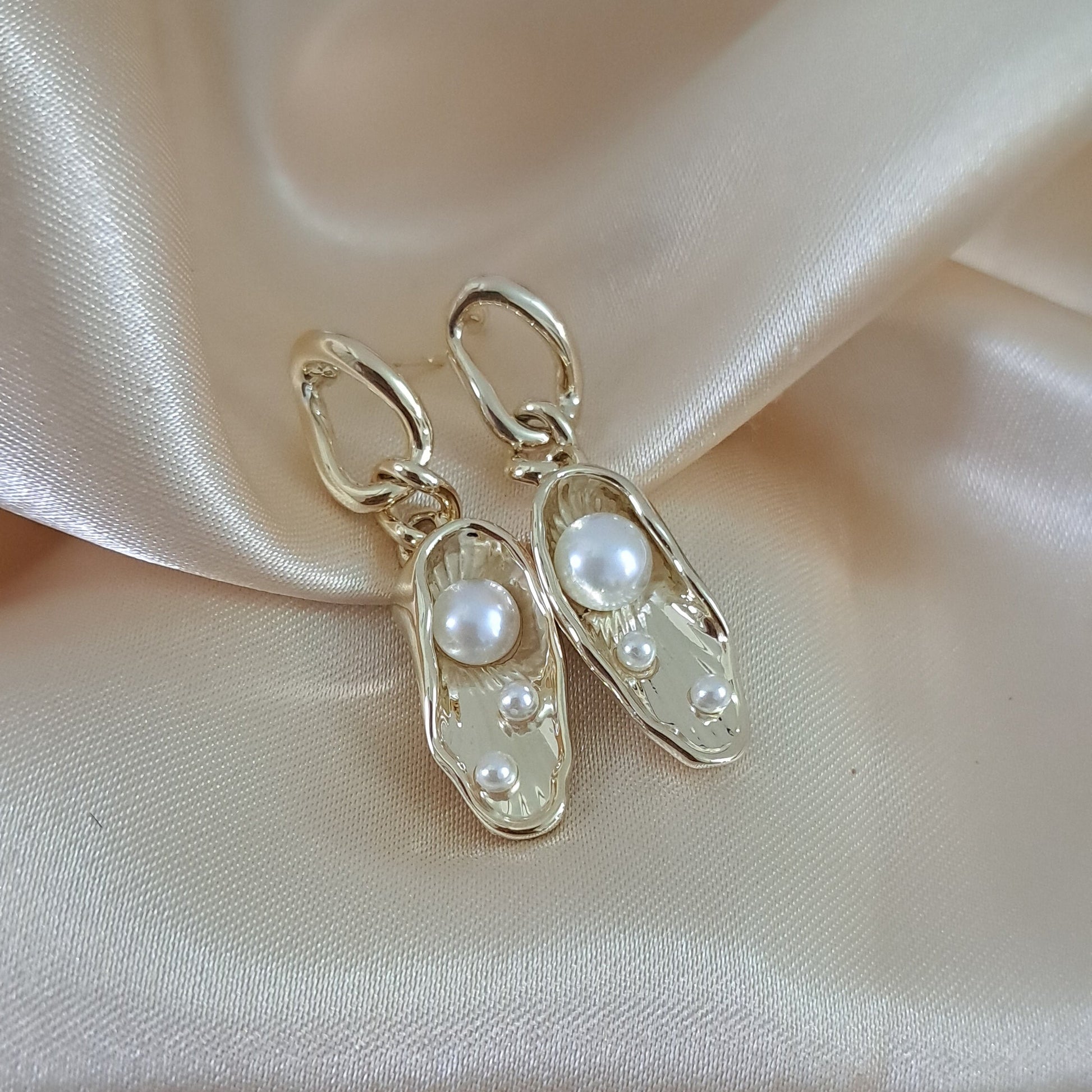 Golden earrings with pearls perfect everyday wear occasions
